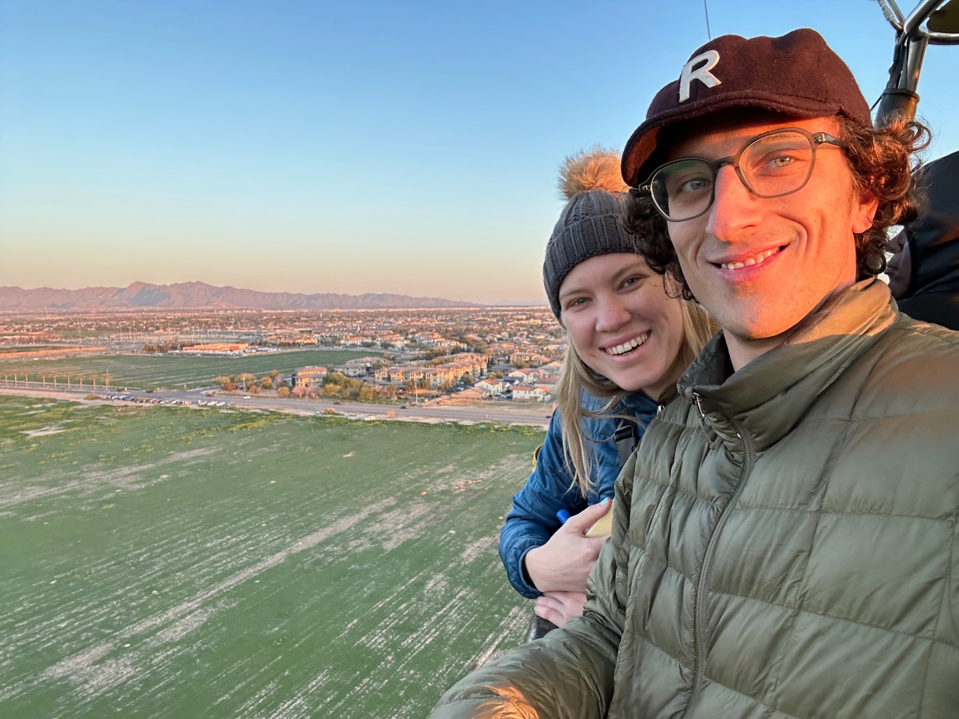 Blake and Josh in a hot air balloon at sunrise